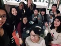 Miss Zhao Xin (front, middle) having desserts with other residents